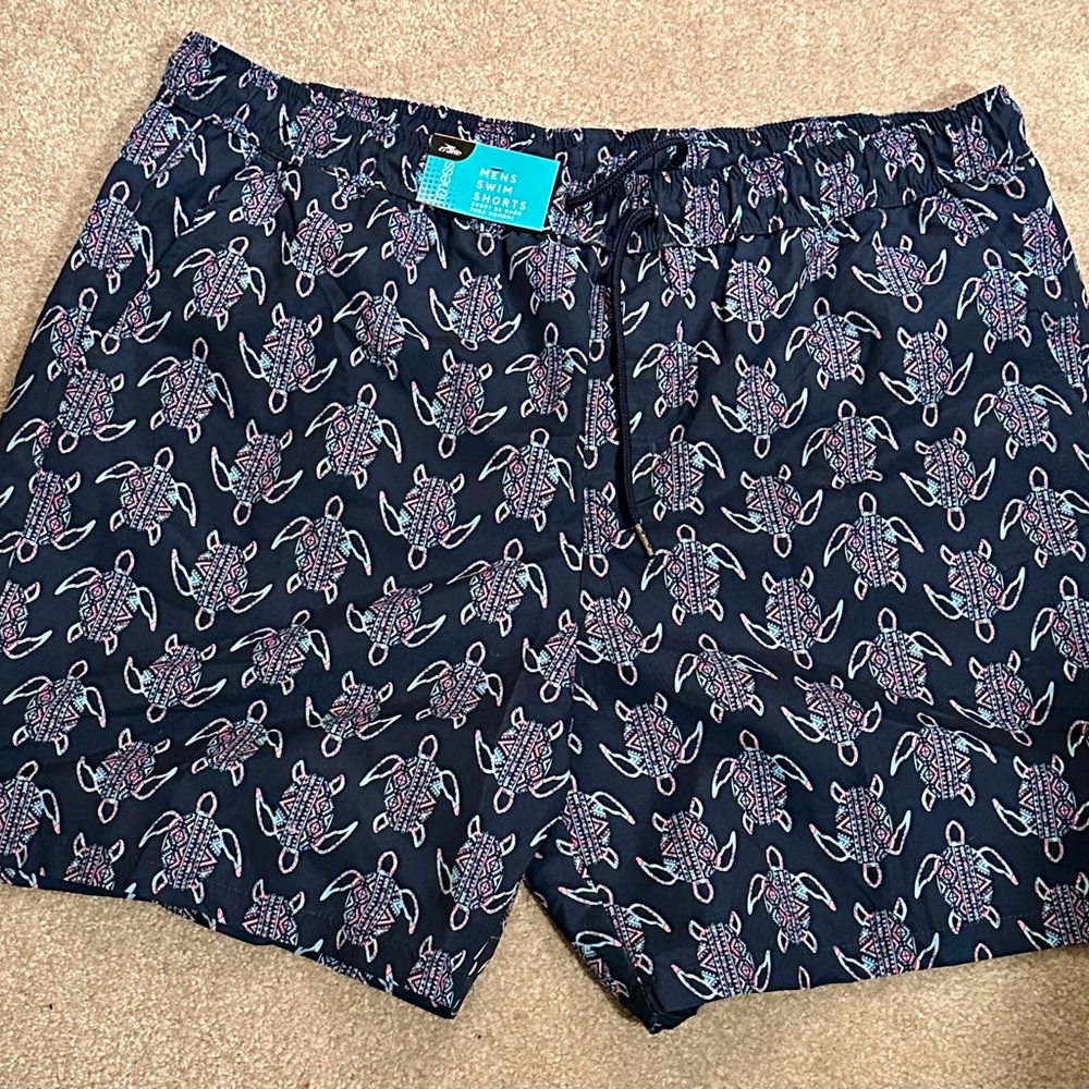 Men’s elastic waist and drawstring swim shorts.